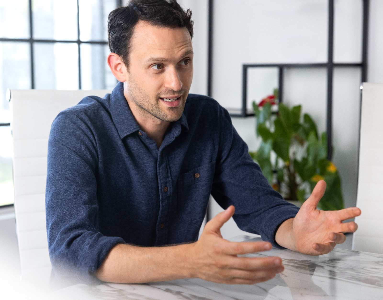 Adam Tepper in a coaching conversation with an investment professional